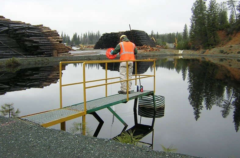 Water quality sampling at a log pond