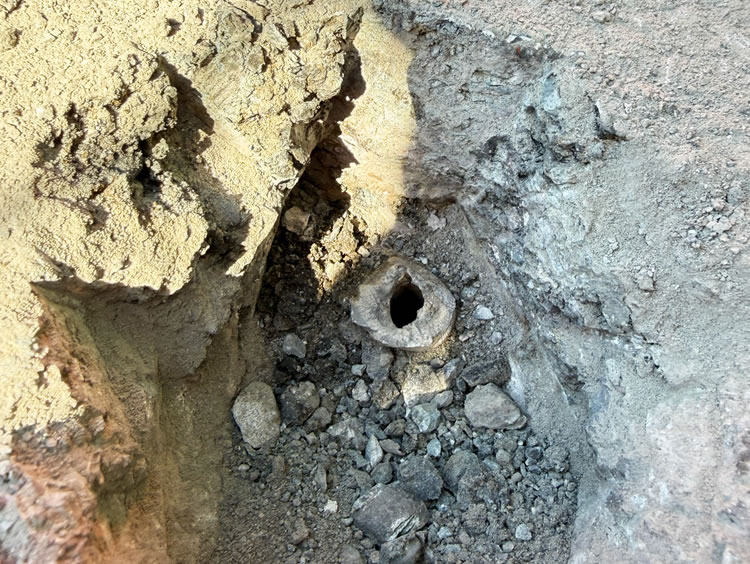 Some monuments were buried under many layers of fill and asphalt or concrete.