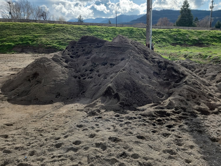 Unsecured stockpiles of soil or fill are noted because they can be sources of surface water contamination.
