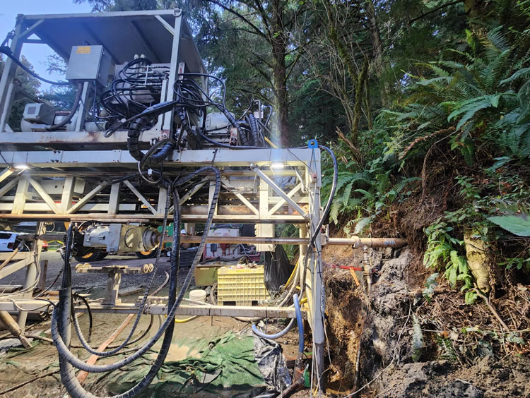 Sideview of horizontal drilling to investigate geological conditions for the tunnel alternative.